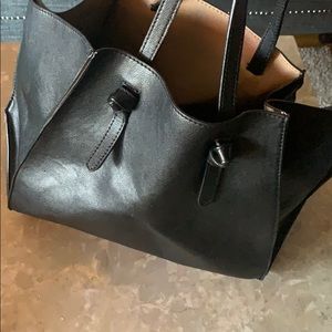 Large black leather tote bag